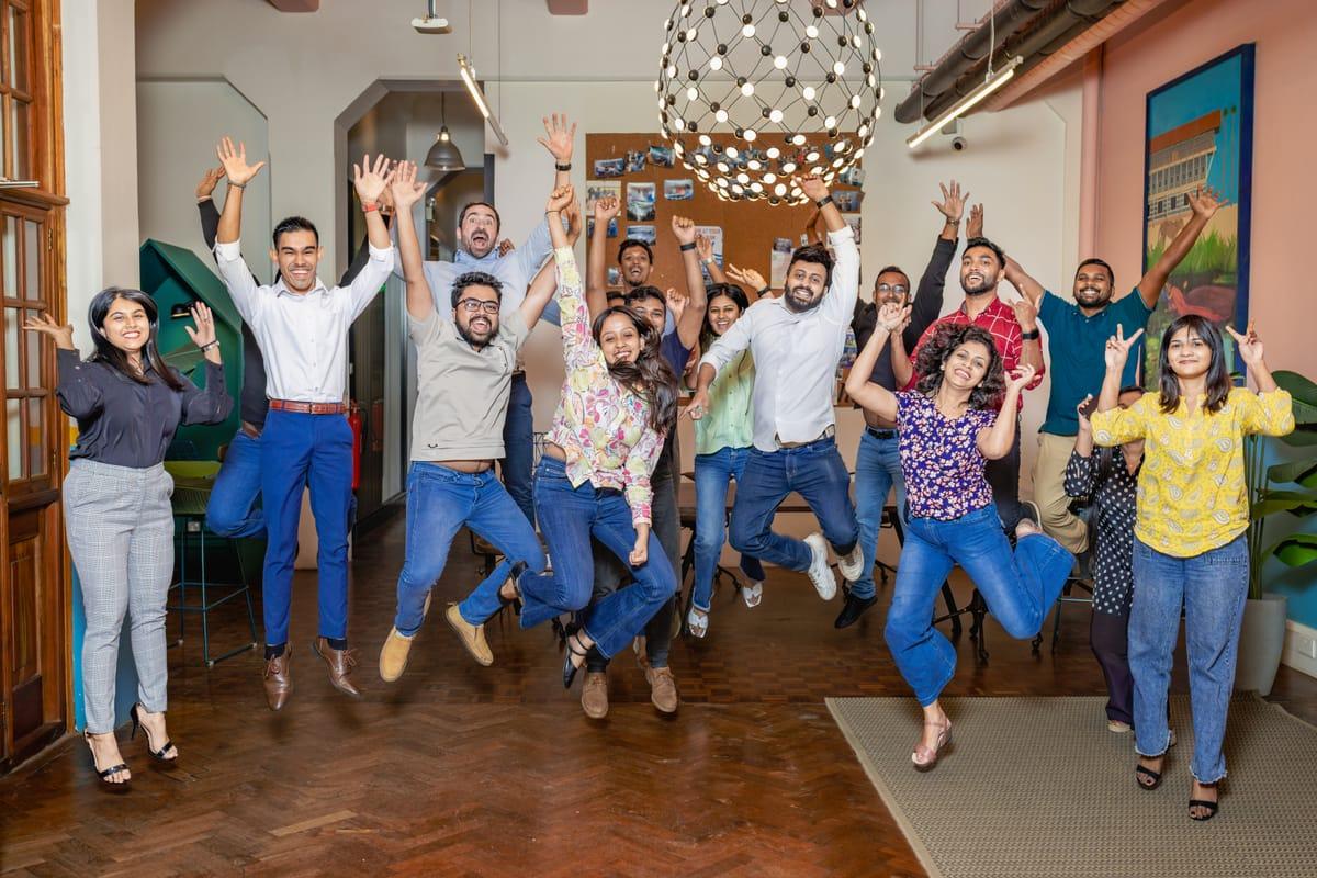 The Raketman team jumping in the air together