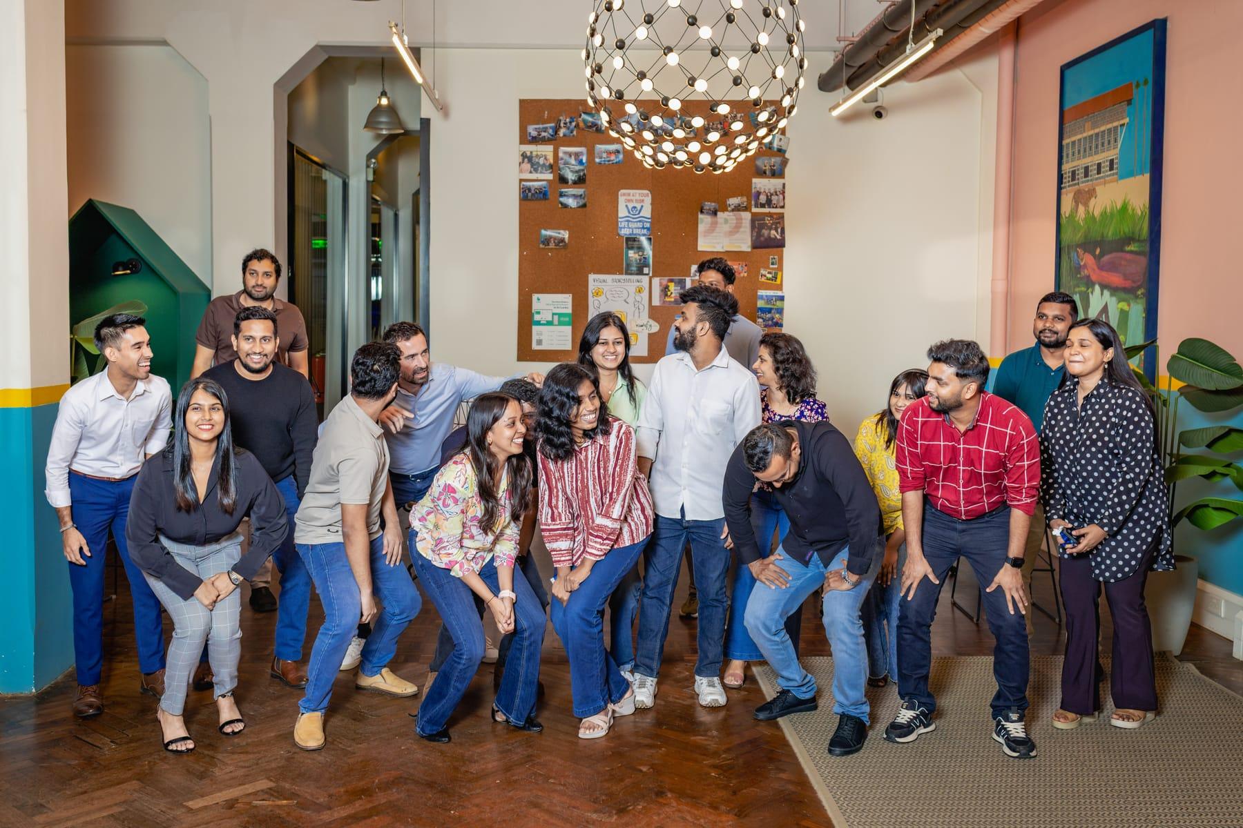 The Raketman team standing together in the lounge at Hatch, Colombo
